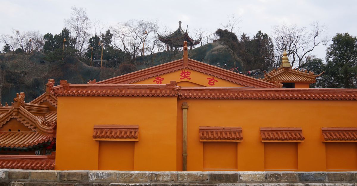 Traditional temple architecture in Nanjing under a clear sky