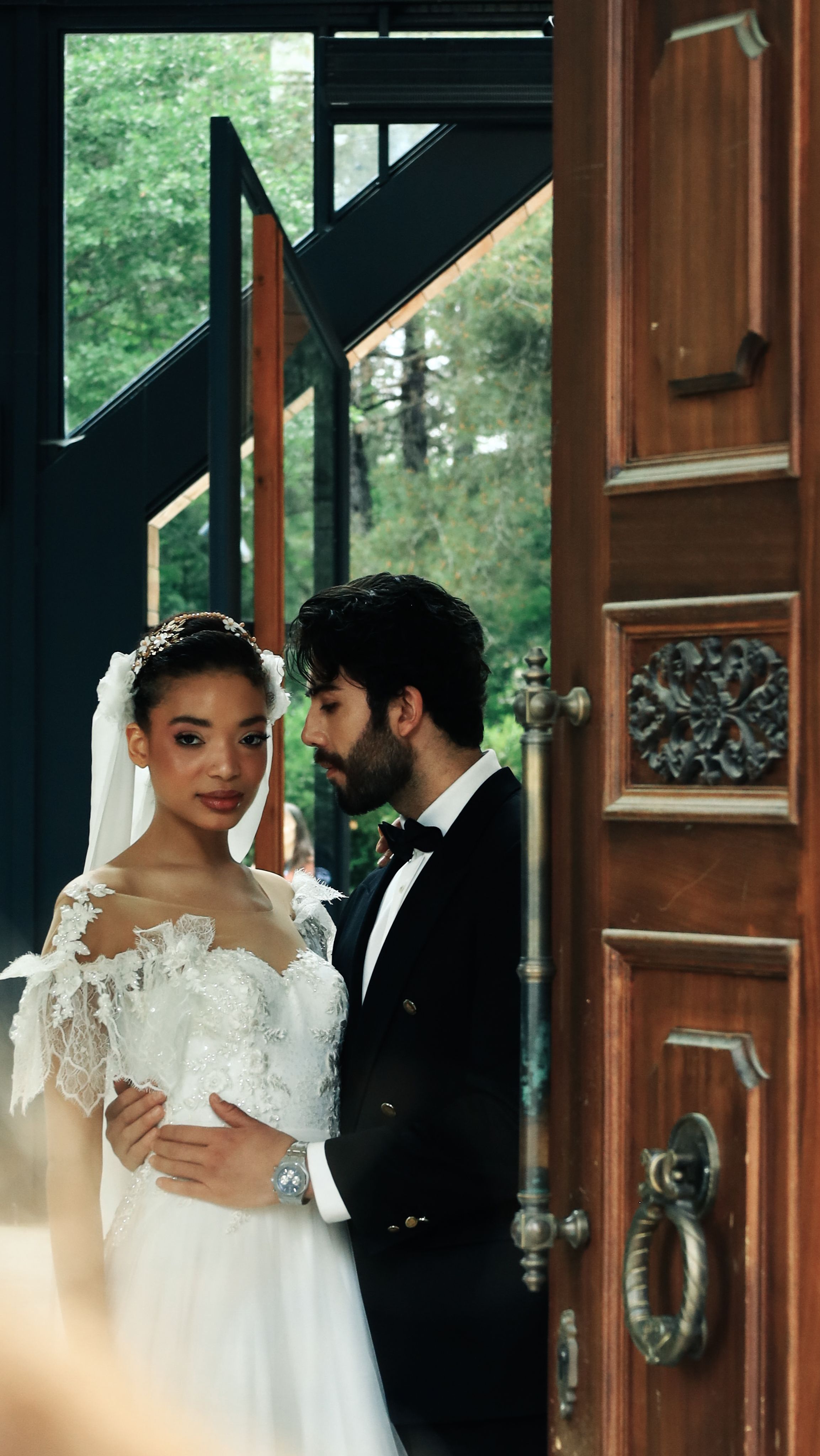 Bride and groom embrace at a stylish Istanbul location, capturing a timeless and elegant moment.