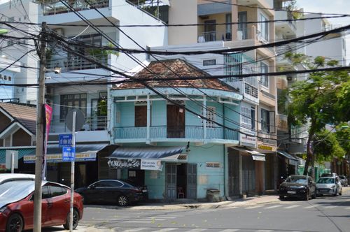 Free Vibrant urban scene featuring colonial architecture and bustling street life. Stock Photo