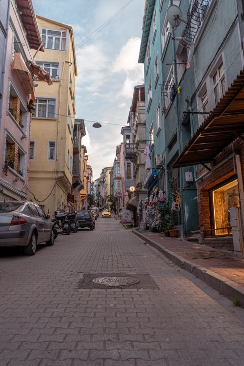 Free Explore a charming street in Istanbul, Turkey with colorful buildings and urban charm. Perfect travel inspiration. Stock Photo