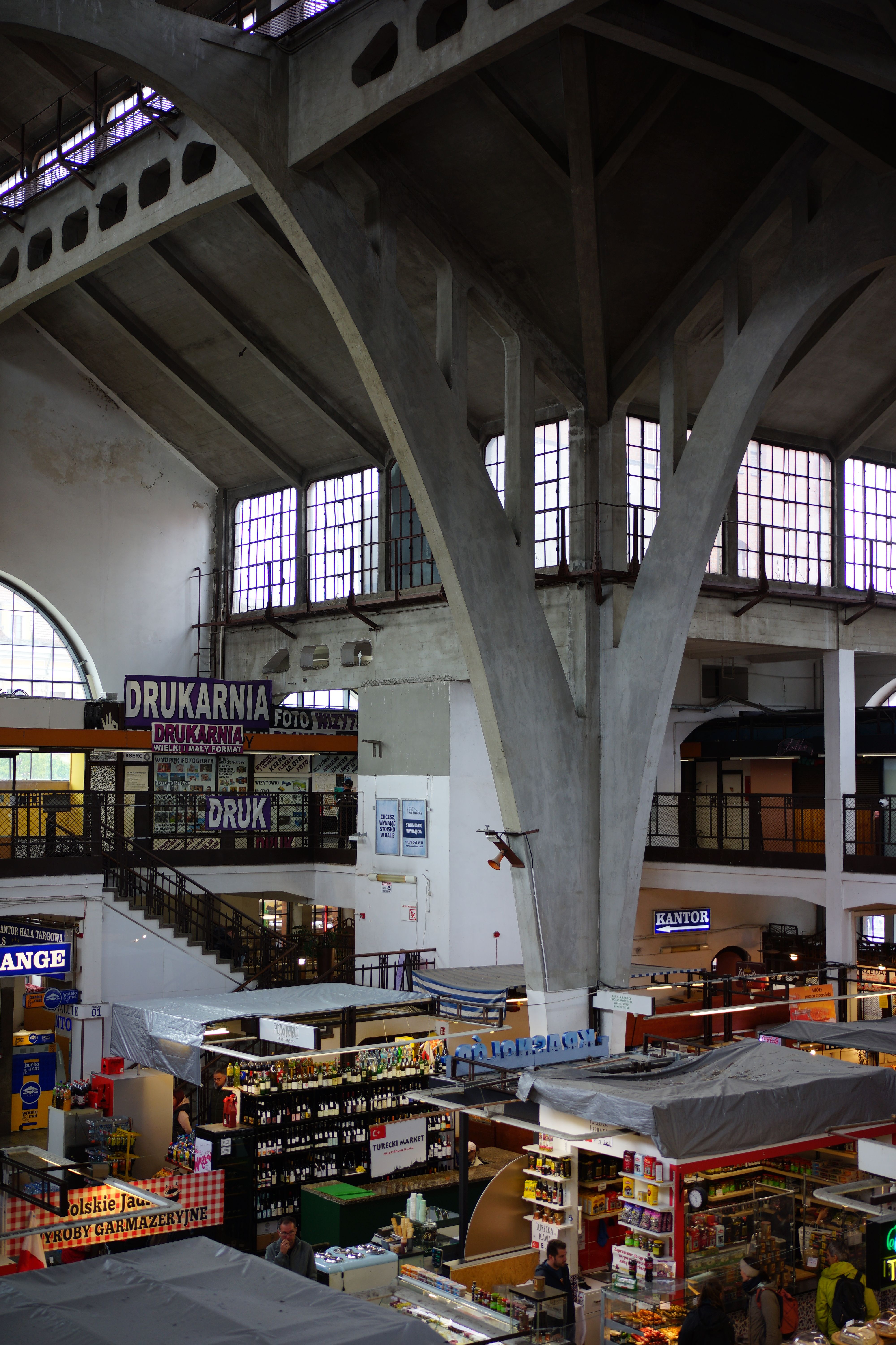 Explore the vibrant Wrocław Market Hall with diverse shops and iconic architecture.