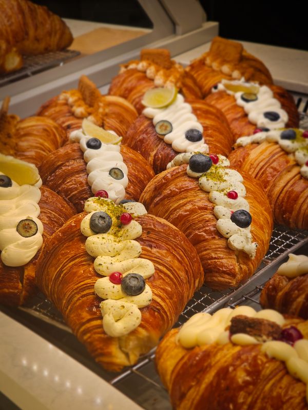 Croissant with cream and berries