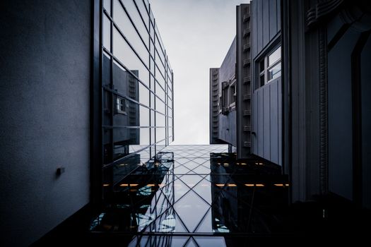 Glass and steel structures rise in the urban skyline of Warsaw, Poland.