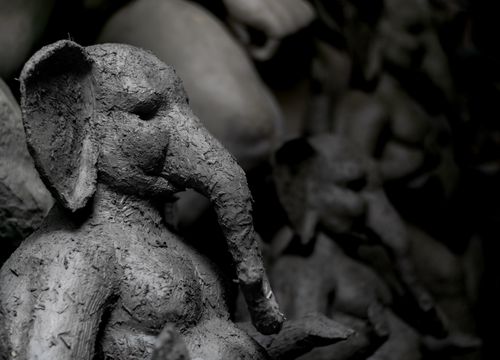 Free Intricately crafted clay Ganesh sculpture in Kolkata workshop, showcasing traditional artisan craftsmanship. Stock Photo