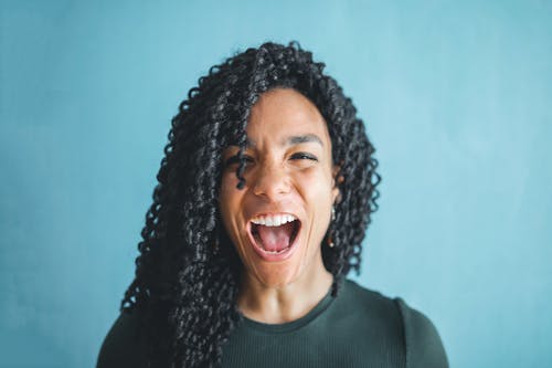 Free Woman In Knitted Shirt Is Screaming Stock Photo