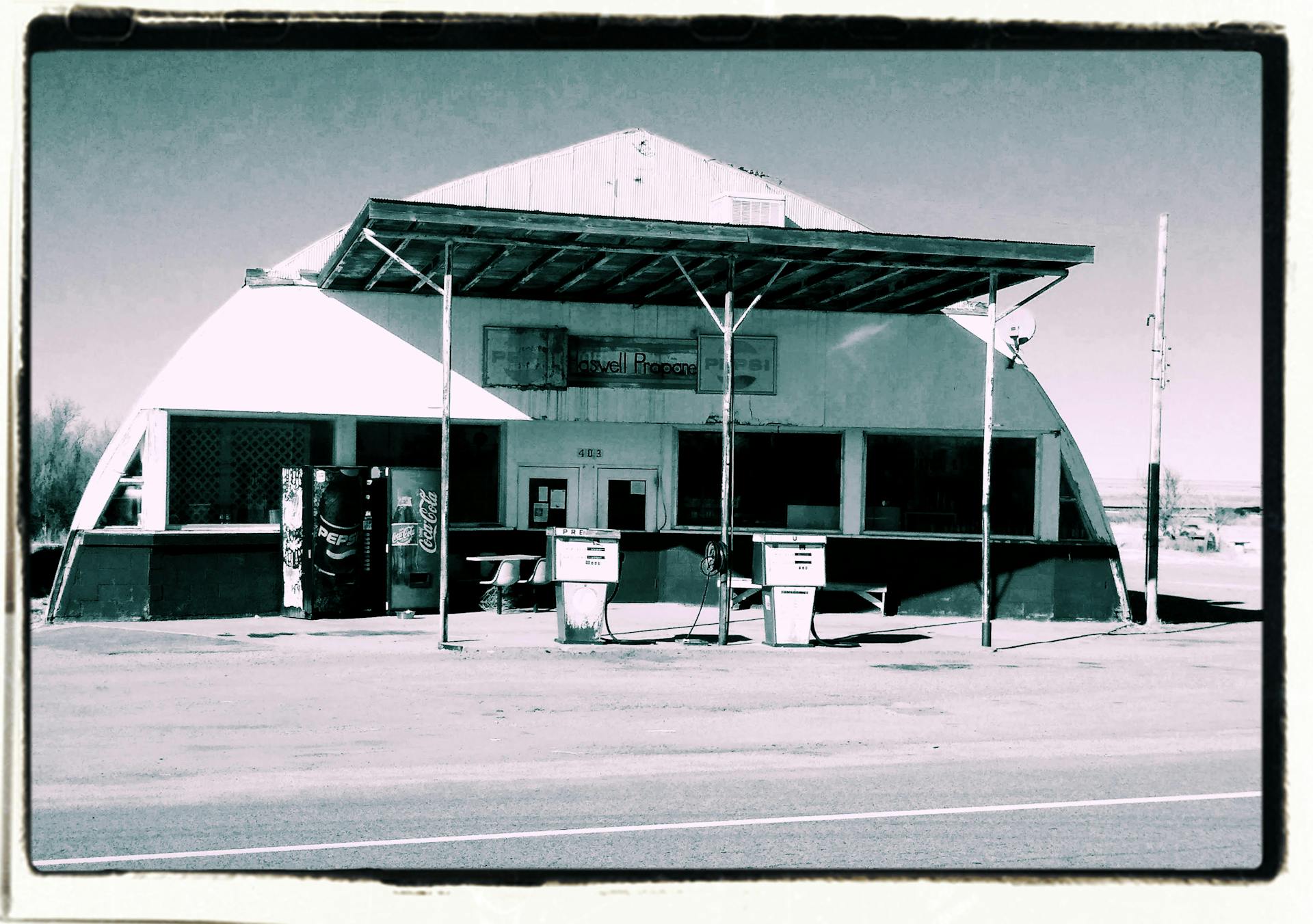 White and Gray Gasoline Station