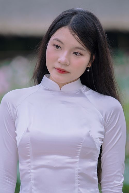 Portrait of a Woman in Traditional Dress · Free Stock Photo