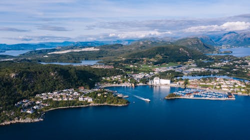 Aerial View of City Near Body of Water