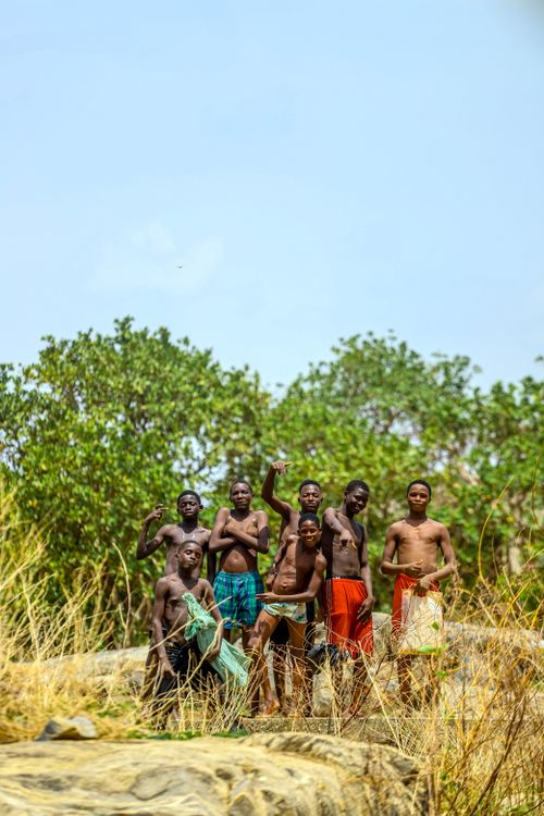 Free A group of indigenous people posing outdoors on a sunny day. Stock Photo