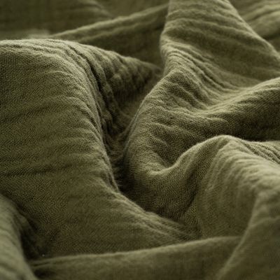 Crumpled sage-green linen cloth &mdash; photo by ALOK DAS on Pexels