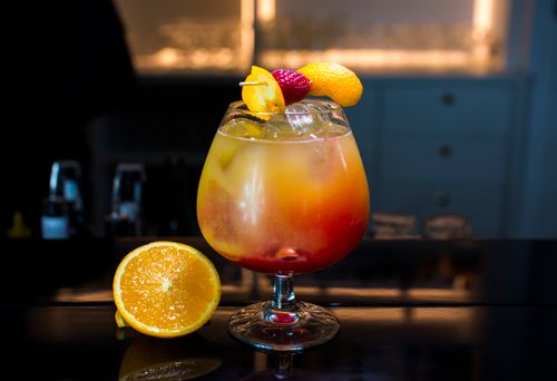 Free A refreshing citrus cocktail with orange slice garnish, perfect for a night out. Stock Photo