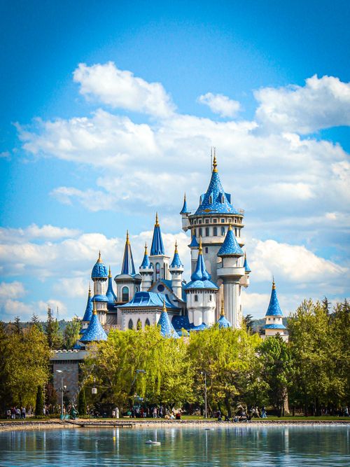 Free Beautiful fairytale castle with blue spires and clear skies at Sazova Park, Eskişehir. Stock Photo