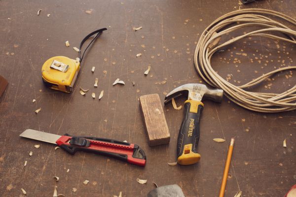Carpentry tools laid out on a workbench