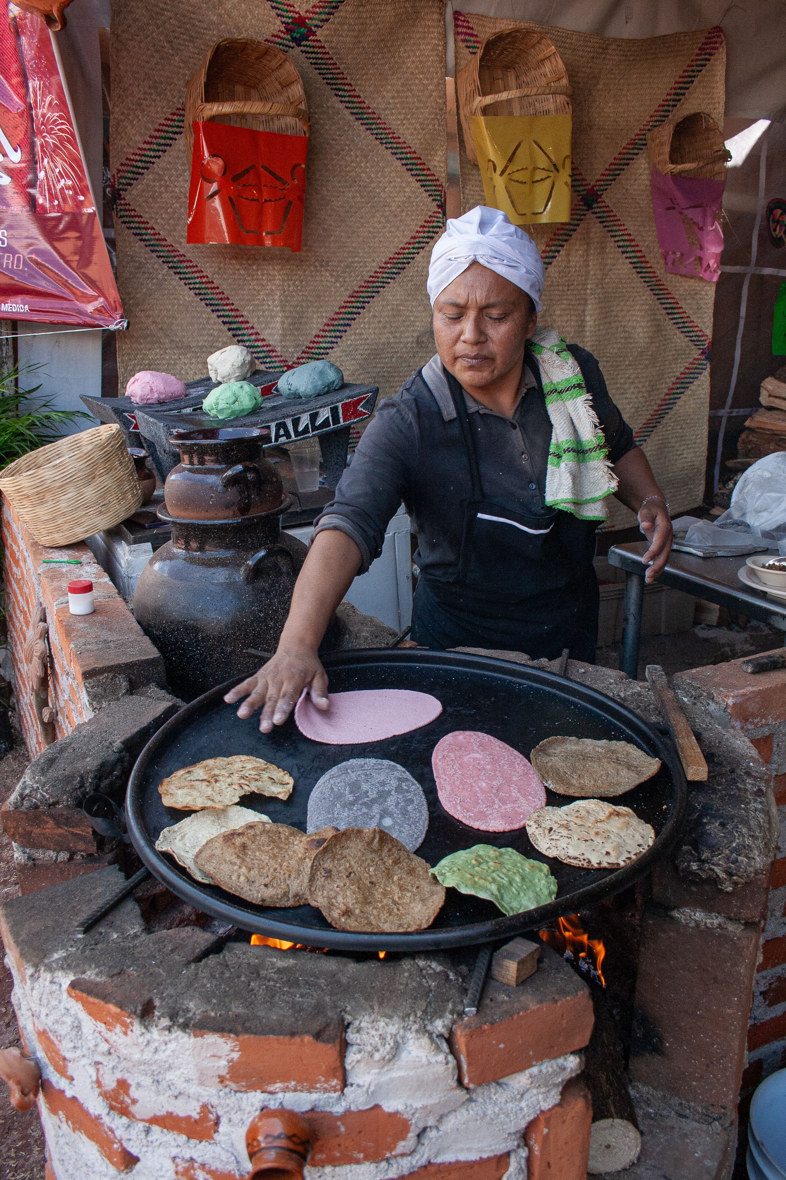 Traditional Mexican tortilla making on comal