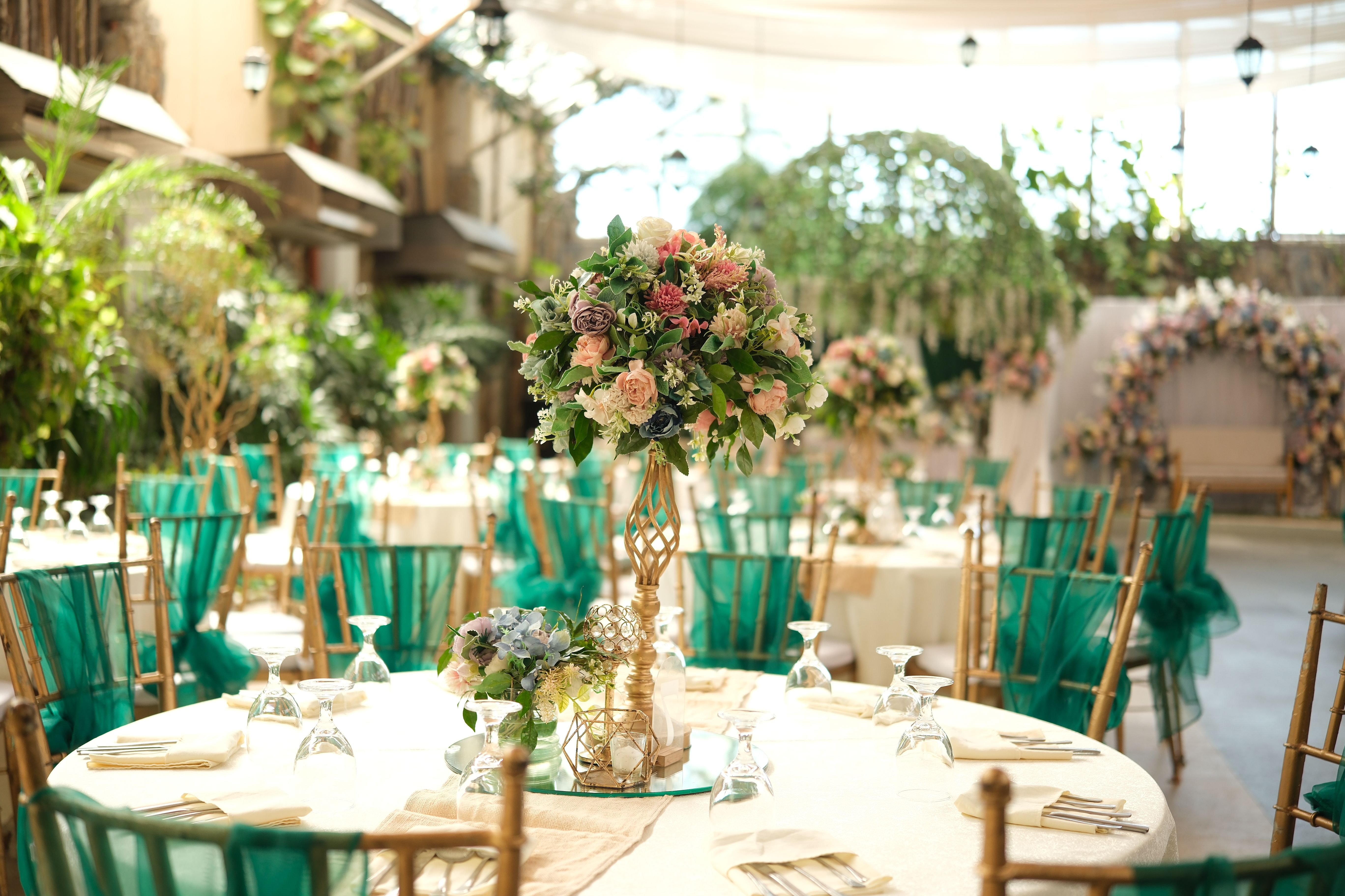 Beautifully decorated outdoor wedding reception with floral centerpieces in Las Piñas, Philippines.