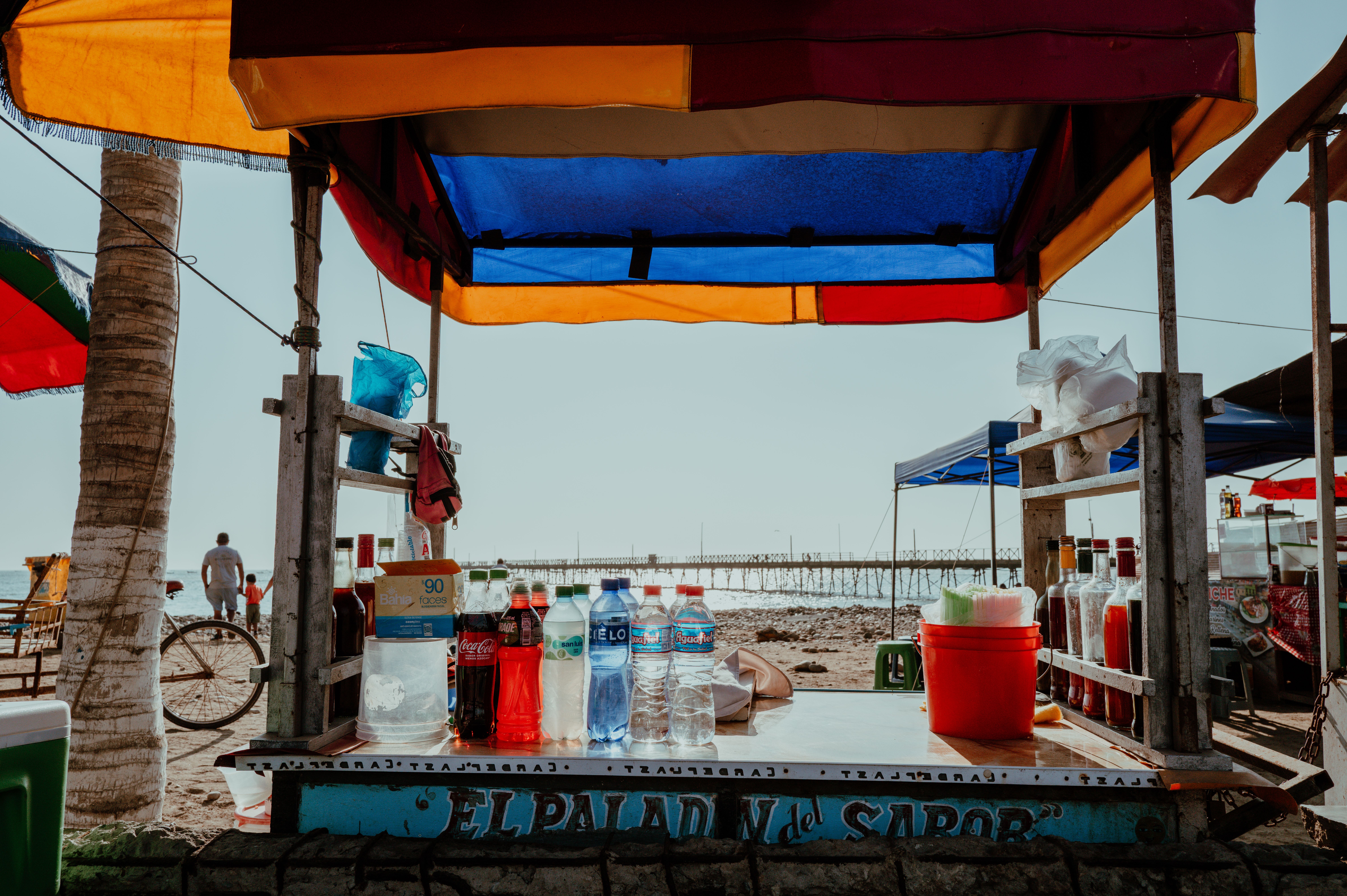 Traveler staying hydrated by drinking bottled water in Cuba