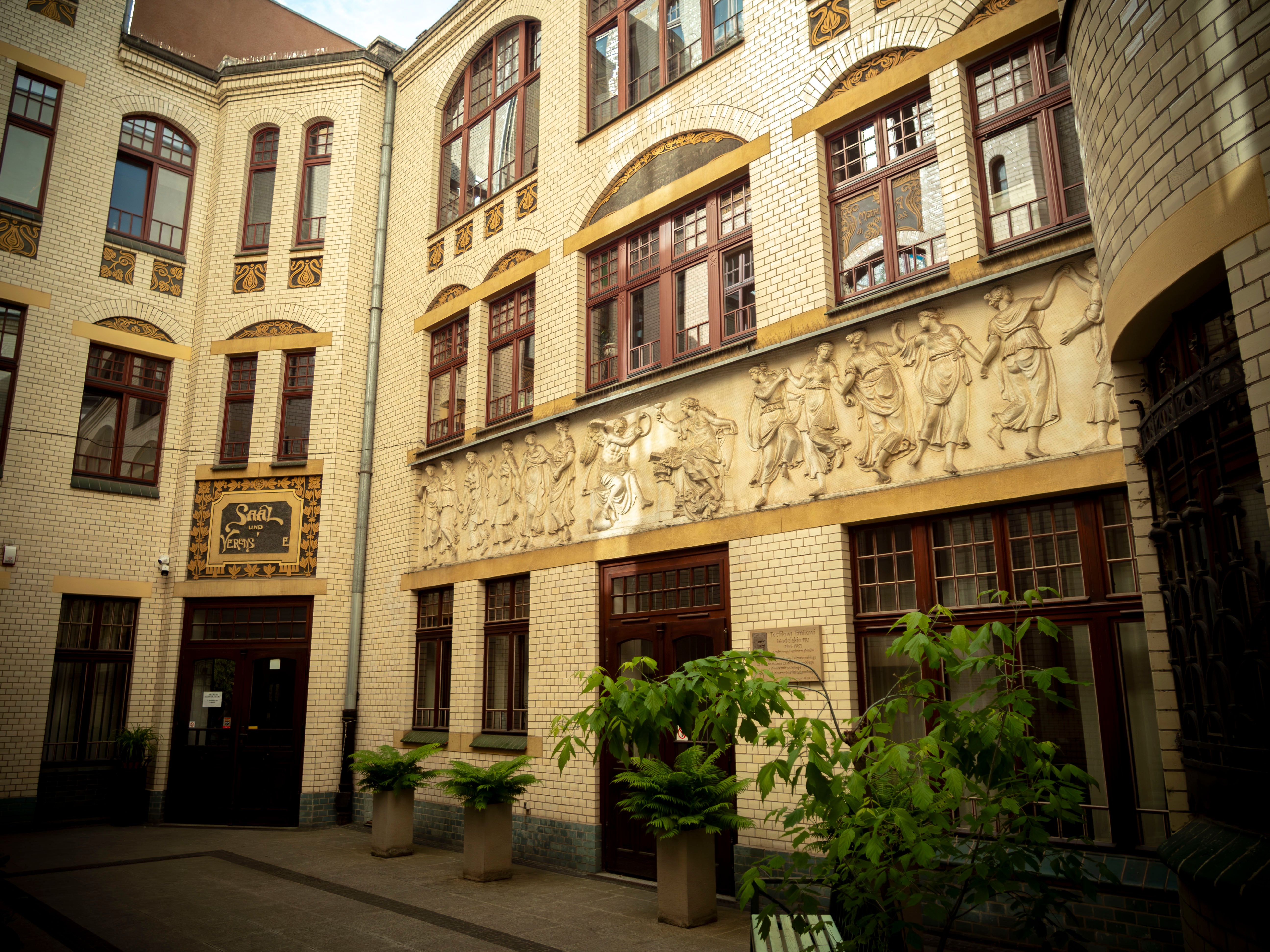 Historic Polish Building with Detailed Frieze · Free Stock Photo