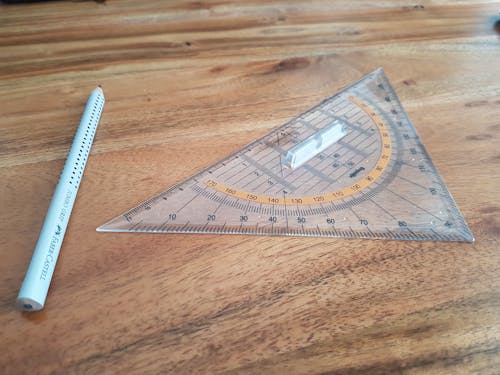 Безкоштовне стокове фото на тему «вимірювання, геометрія, дерев’яний стіл»