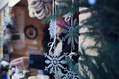 Shallow Focus Photography of Snowflakes Christmas Tree Decor