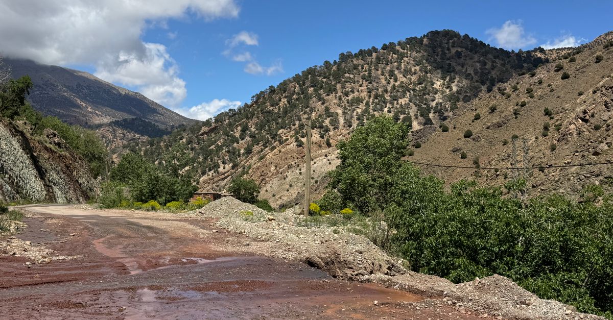 Winding mountain road through the High Atlas range — the Tizi n'Tichka pass route on the 7 days from Marrakech tour