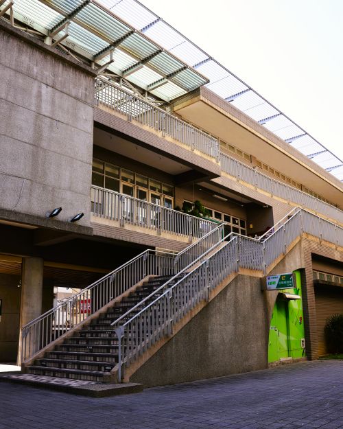Free Contemporary architecture with a prominent staircase outside a building in Taiwan, highlighting modern design. Stock Photo