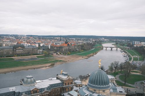 Free A stunning aerial view of Dresden showcasing the Elbe River and historic architecture. Stock Photo