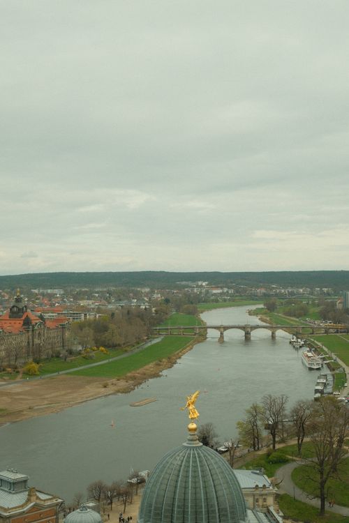 Free Aerial shot of Dresden, Germany's skyline with the Elbe River and iconic architecture visible. Stock Photo