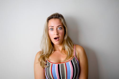 Free Woman in White and Blue Stripe Tank Top Stock Photo