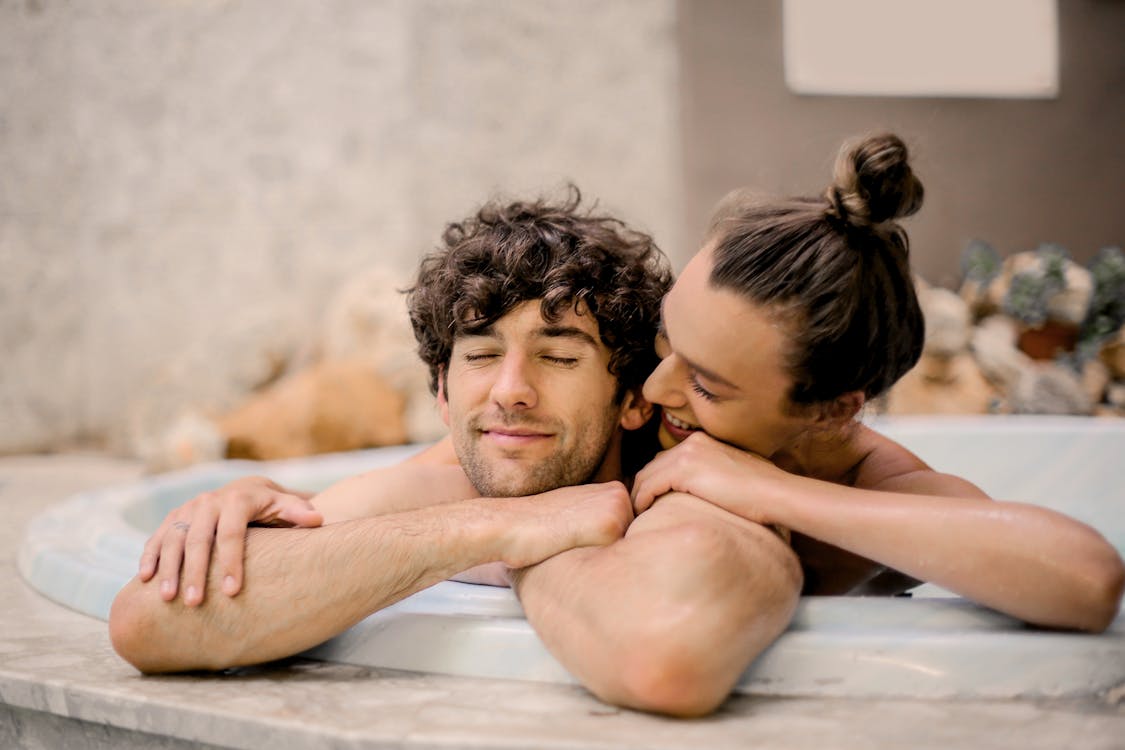 Man and Woman on Bathtub