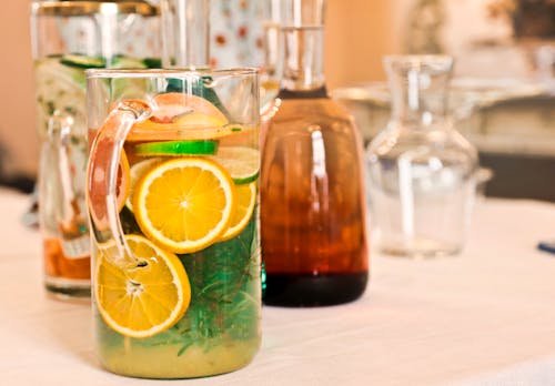 免費 透明玻璃瓶橙汁 圖庫相片
