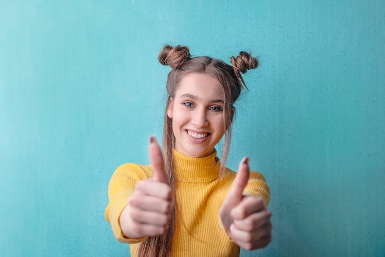 Woman In Yellow Turtleneck Sweater Smiling