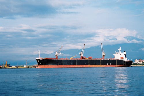 Free stock photo of blue sky, cargo ship, city