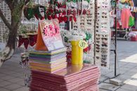 Vibrant market stall in Ciudad de México selling craft supplies and festive decorations.