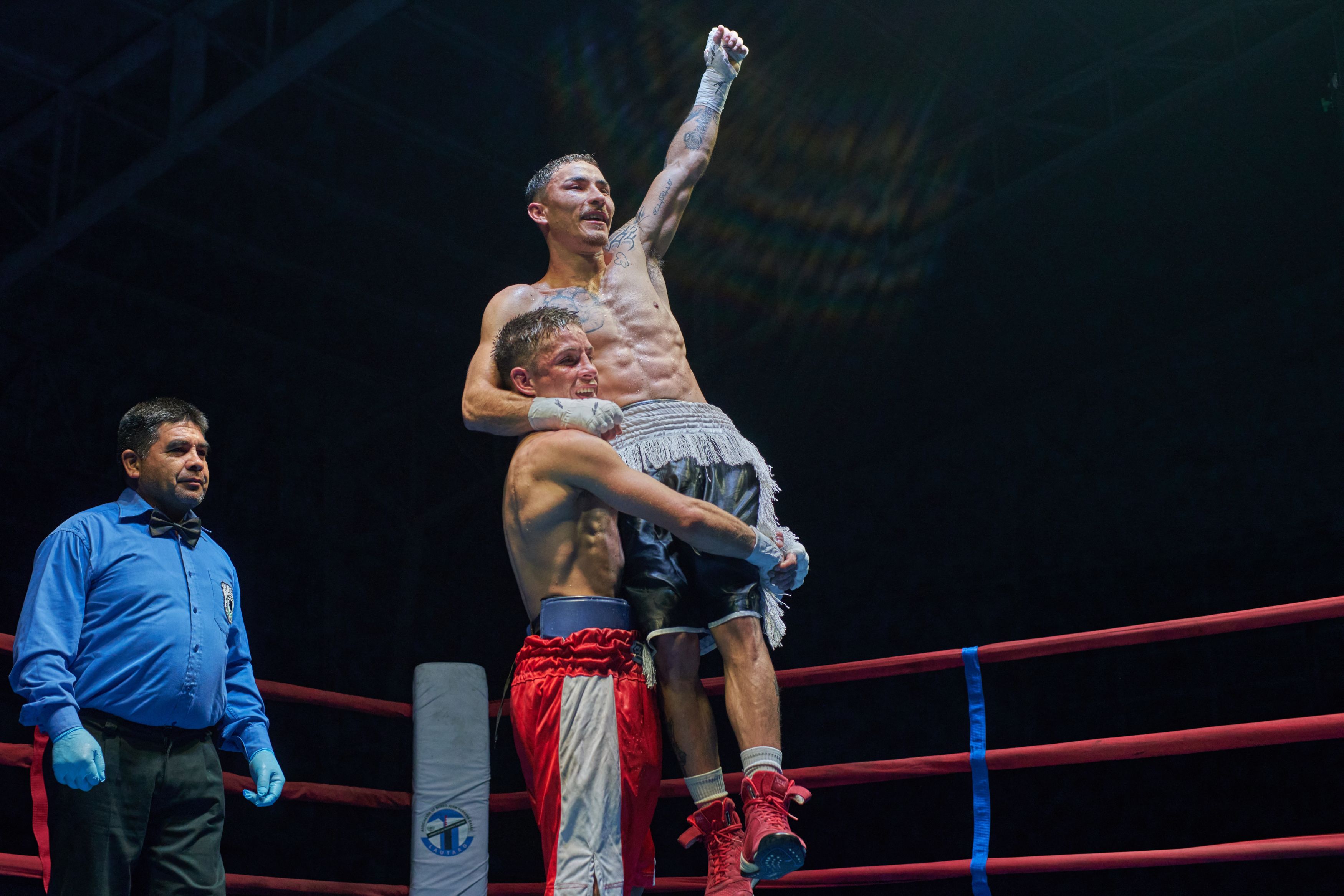 Celebratory Moment in a Competitive Boxing Match · Free Stock Photo