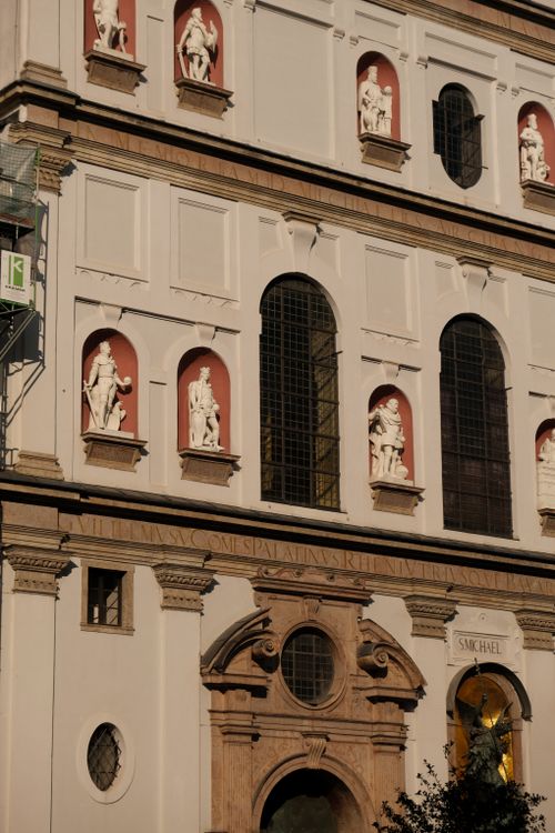 Free A detailed view of a historic building facade featuring classical sculptures. Stock Photo