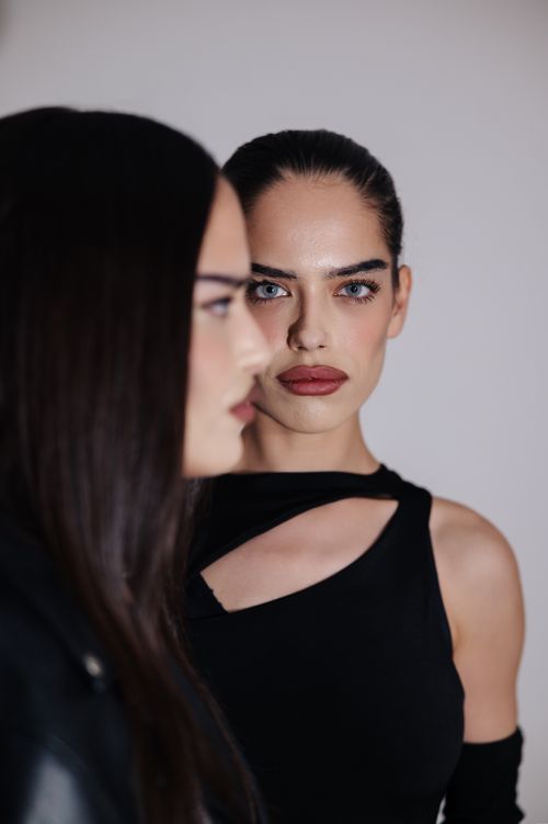 Free Two women posing with strong expressions, showcasing modern fashion in Ferizaj. Stock Photo