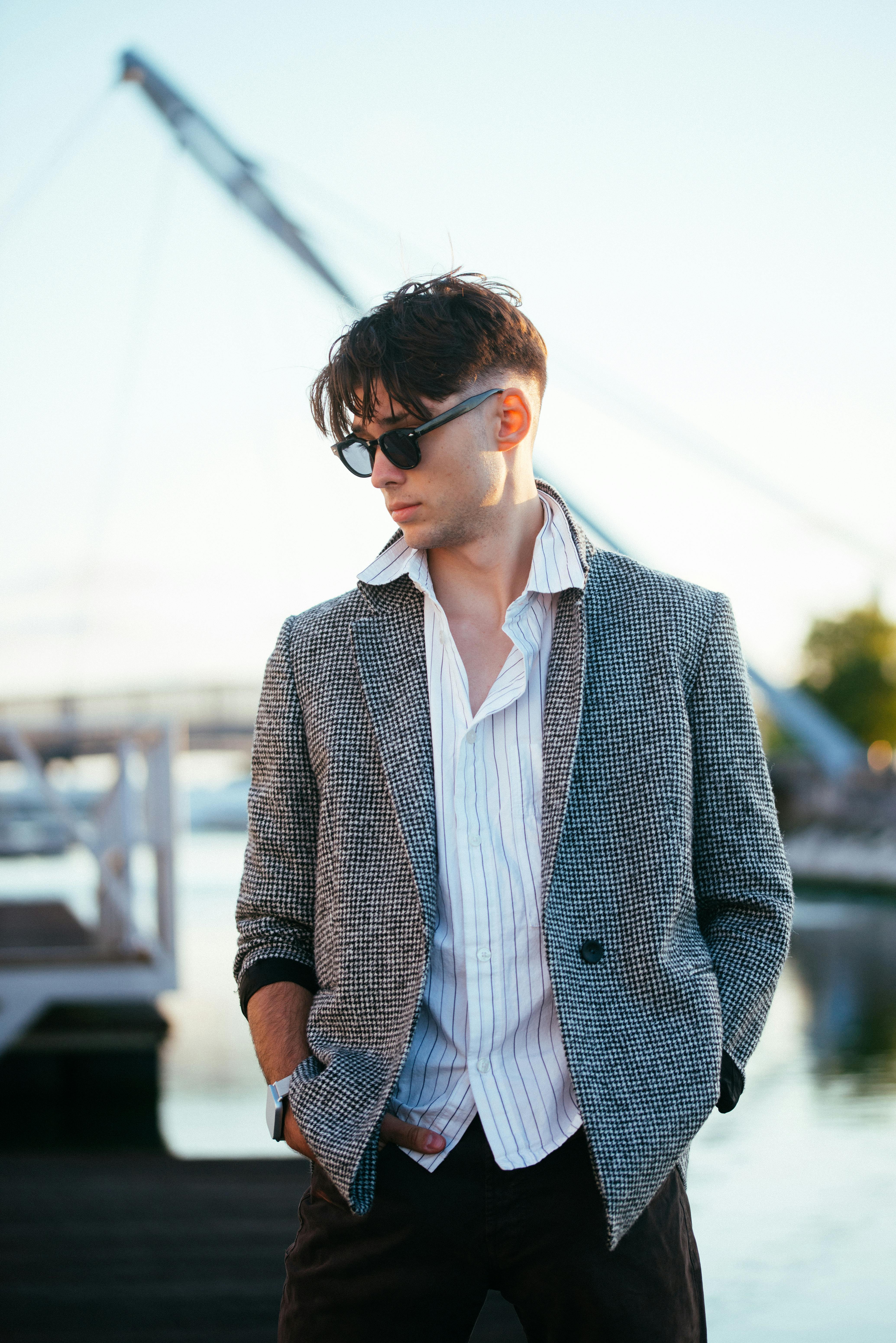 A relaxed blazer and sunglasses by the water, the mood of modern tailoring when seersucker stops trying to look inherited.