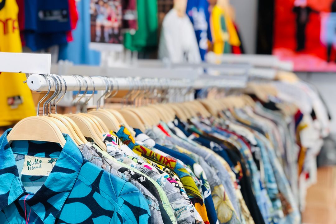 Shallow Focus Photo of Clothing Rack