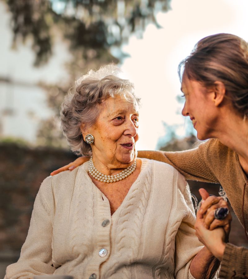 An elderly parent cared for gently at Ohud Dental, Lahore