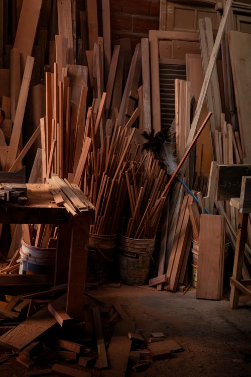 Free A collection of wooden planks and panels in an Argentine workshop during the day. Stock Photo
