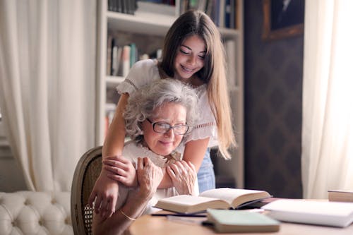 Free Photo of Woman Embracing Her Grandmother Stock Photo