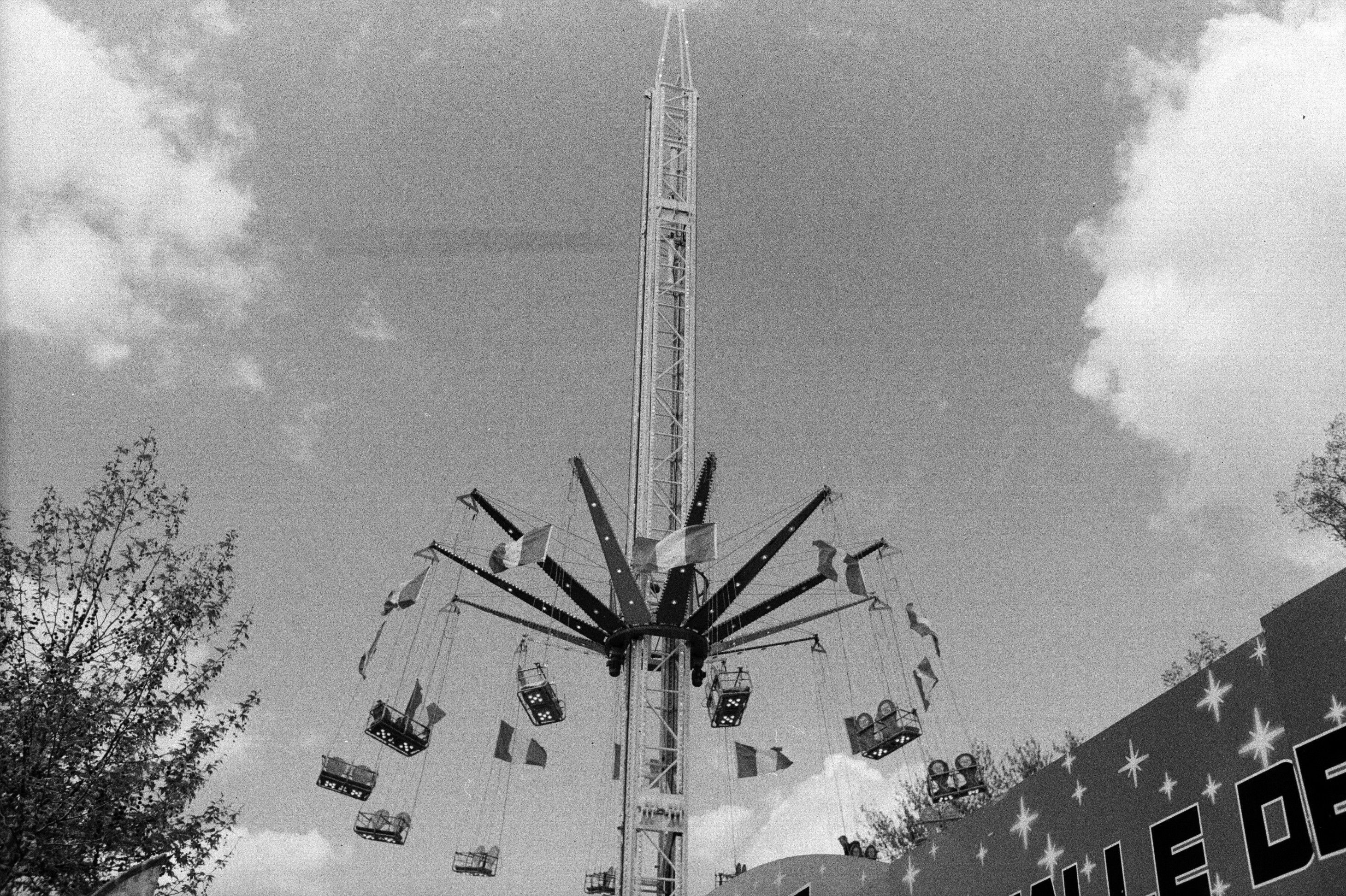 Black and White Carnival Ride in Motion · Free Stock Photo