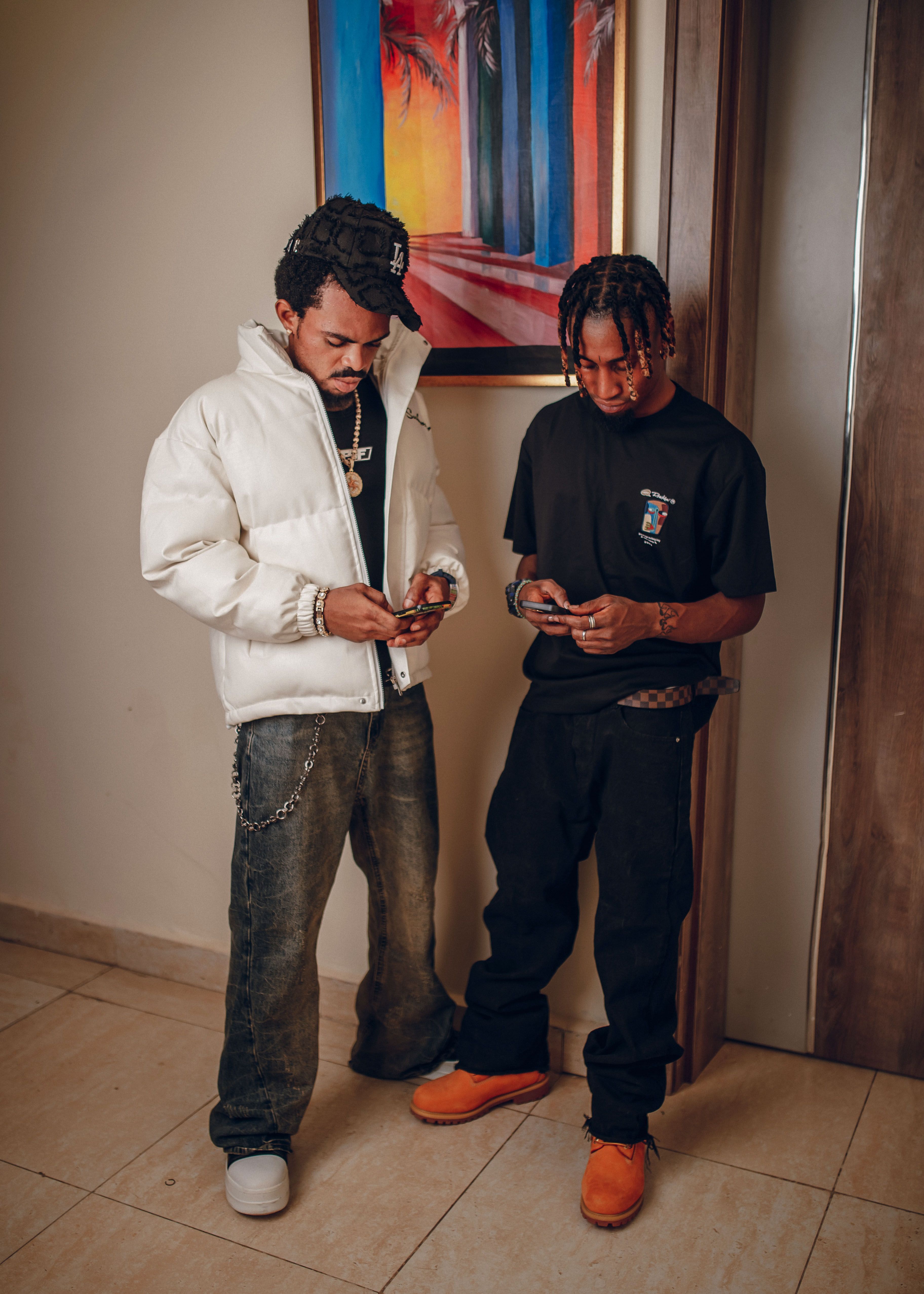 Casual Fashion Scene with Two Young Men Indoors