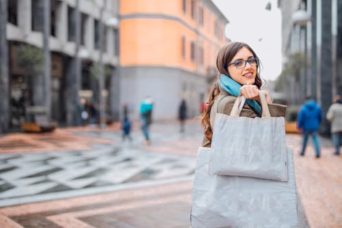 Woman Carrying Tote Bags