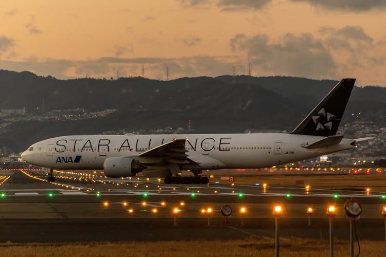 White Passenger Plane On Airport