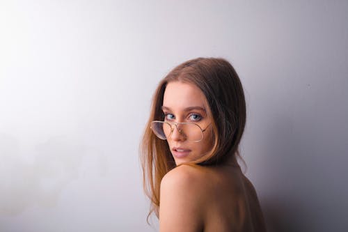 Free Topless Woman Wearing Black Framed Eyeglasses Stock Photo