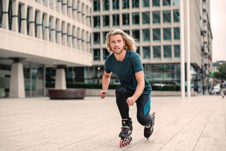 Photo Of Man Roller Skating