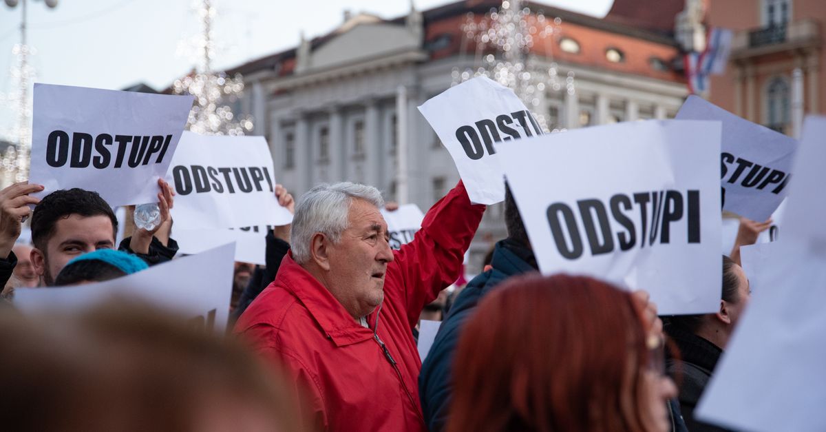 Protesters in Zagreb, Croatia, holding signs reading 'ODSTUPI', demanding change during a public demonstration.