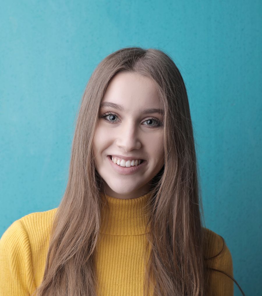 Woman laughing in a bright wellness space