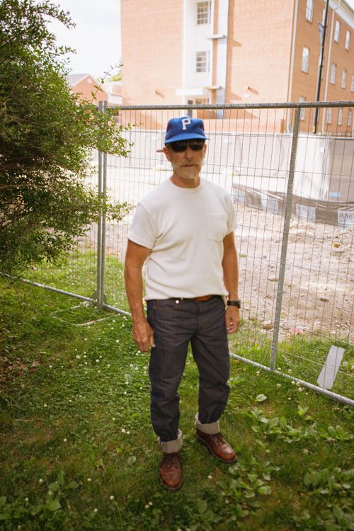 Free Male in casual outfit with blue cap and denim, outdoors in Brevard. Stock Photo